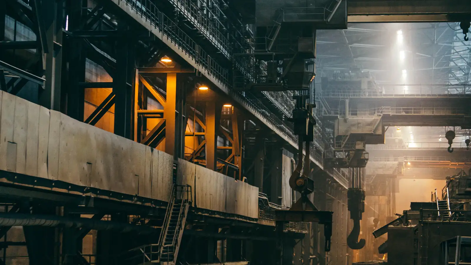 Inside a large industrial factory hall with machinery